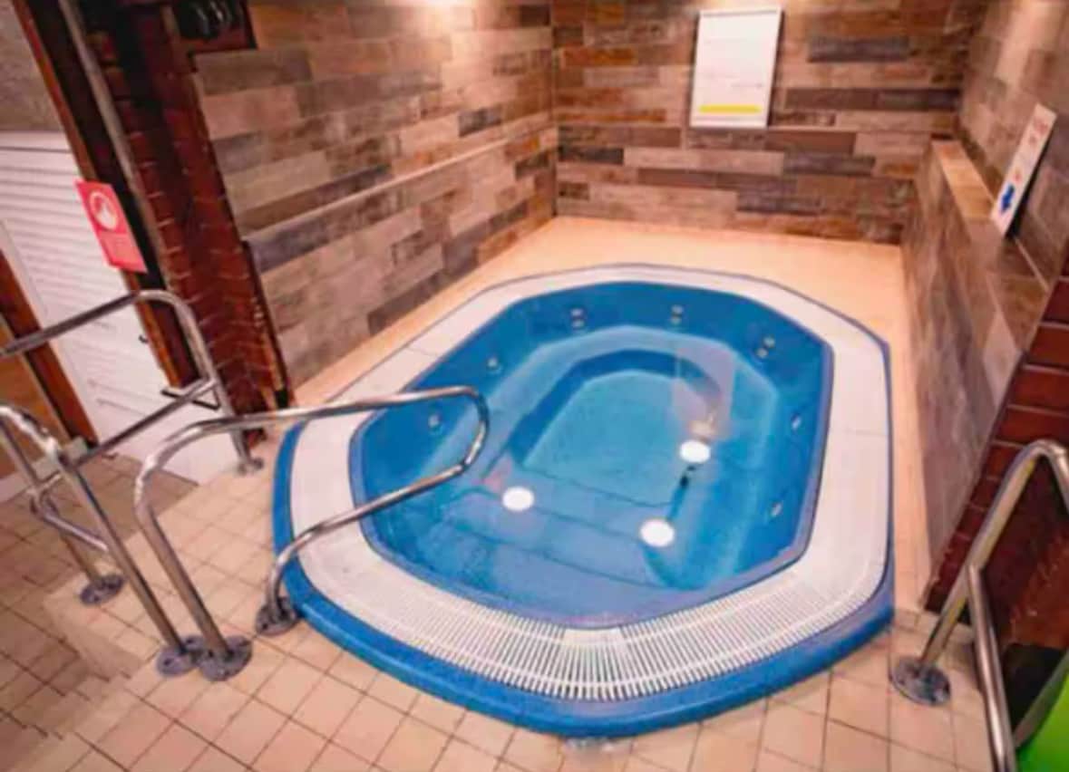 Shared indoor jacuzzi spa at the leisure complex