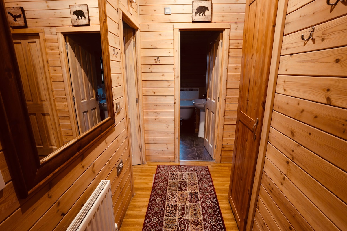 Pine-panelled hallway leading to the bedrooms and bathroom